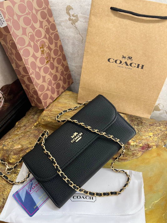 COACH – Pochette Tabby