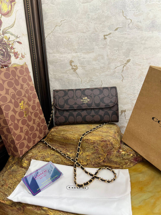 COACH – Pochette Tabby