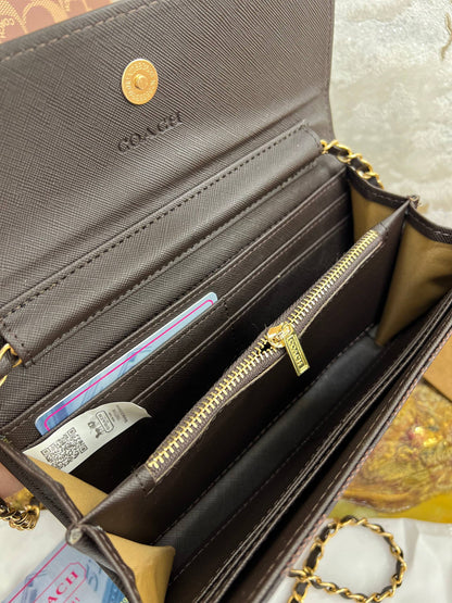 COACH – Pochette Tabby