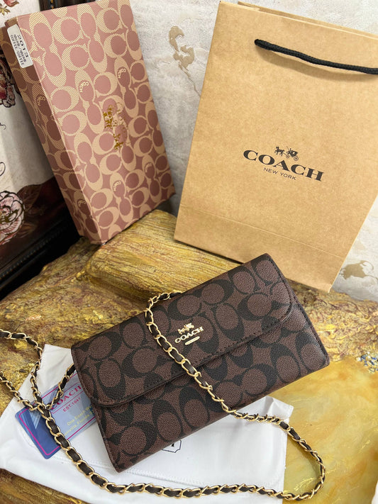 COACH – Pochette Tabby