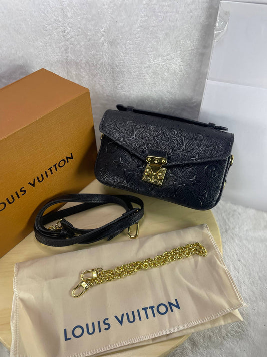 LOUIS VUITTON – Pochette Métis East West