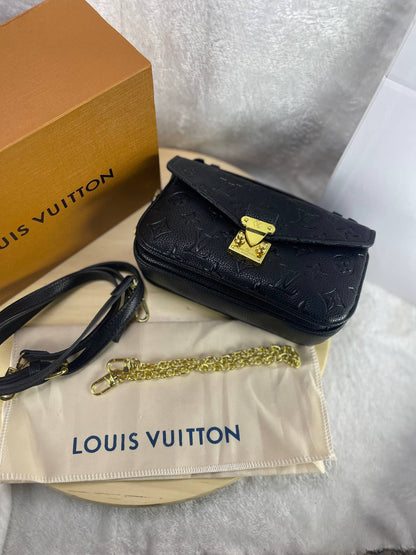 LOUIS VUITTON – Pochette Métis East West