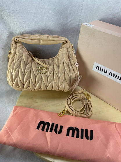 MIU MIU – Wander